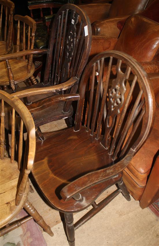 Two Regency mahogany open arm chairs